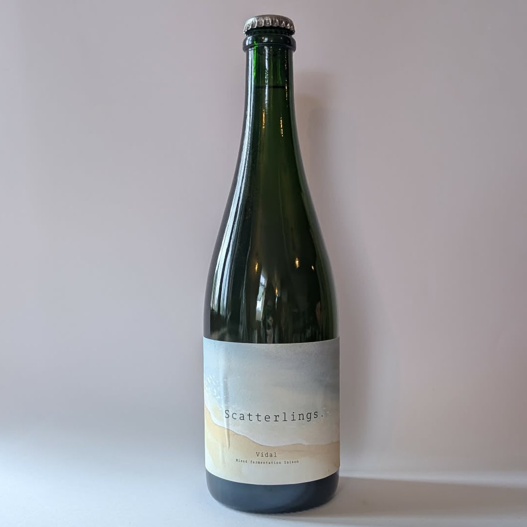 750ml bottle of Scatterlings Brewing & Blending Vidal saison.